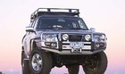 Бампер Deluxe Nissan Patrol GU Y61